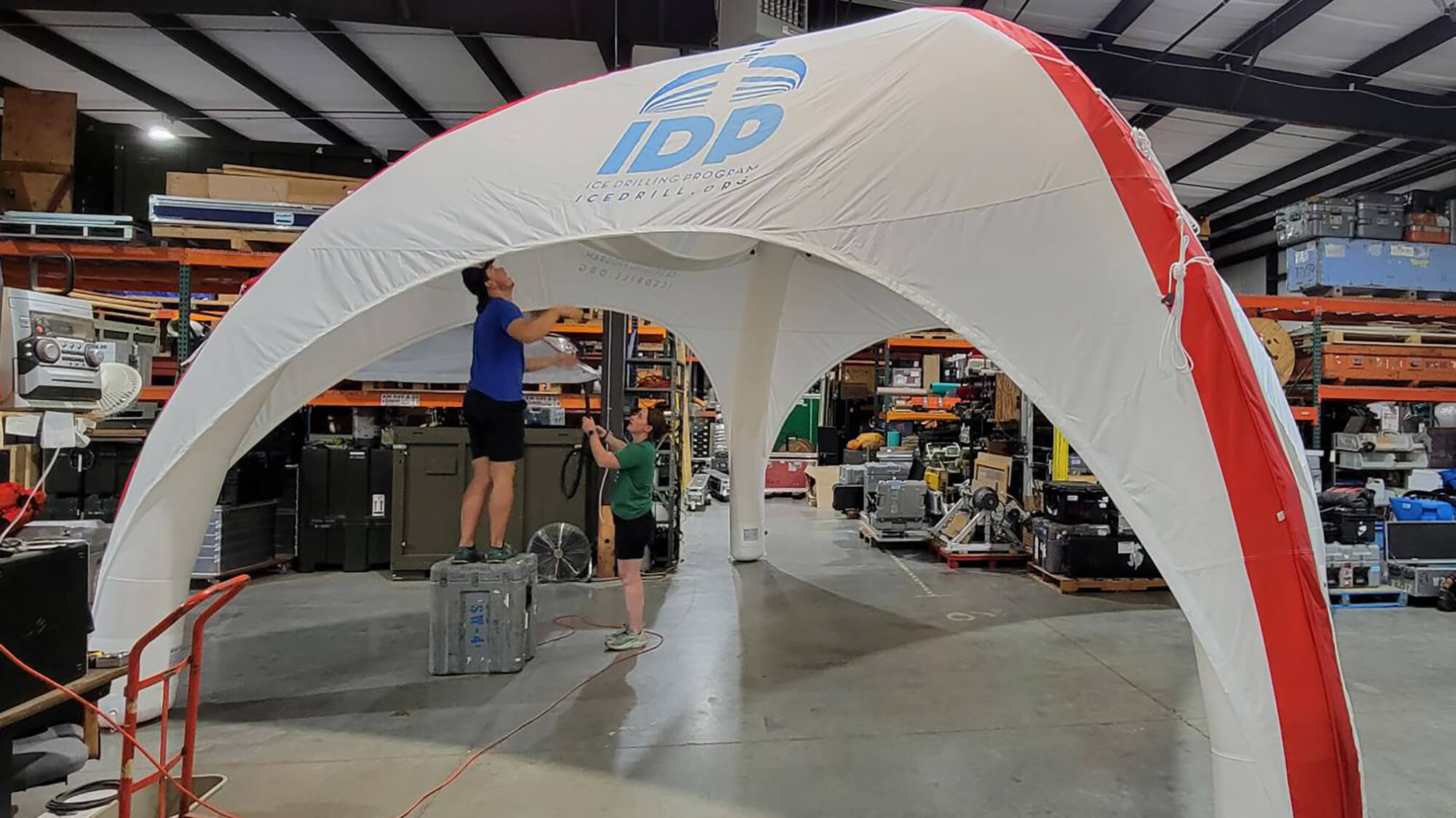 The 6 meter x 6 meter Axion tent set-up inside the IDP-WI warehouse. Photo credit: IDP.